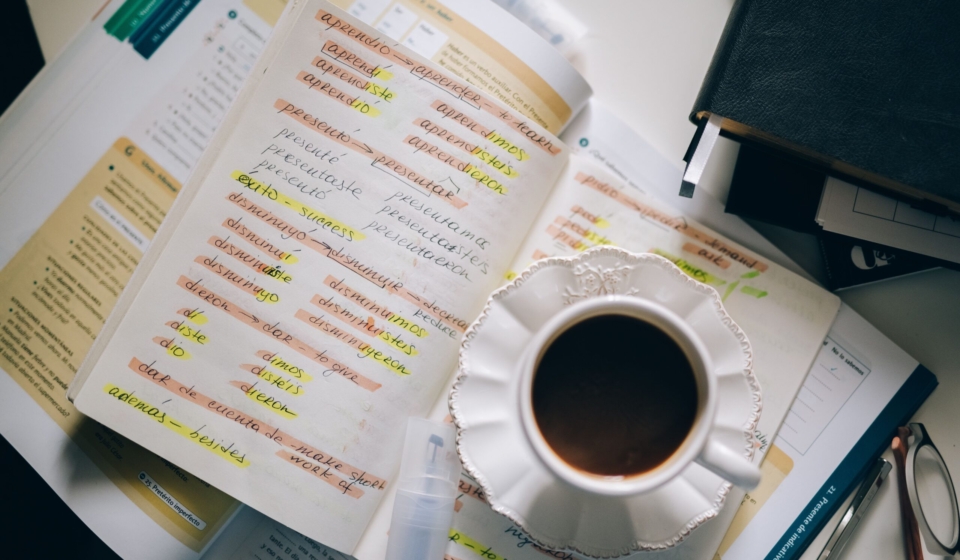 Business cost planning with documents and laptop